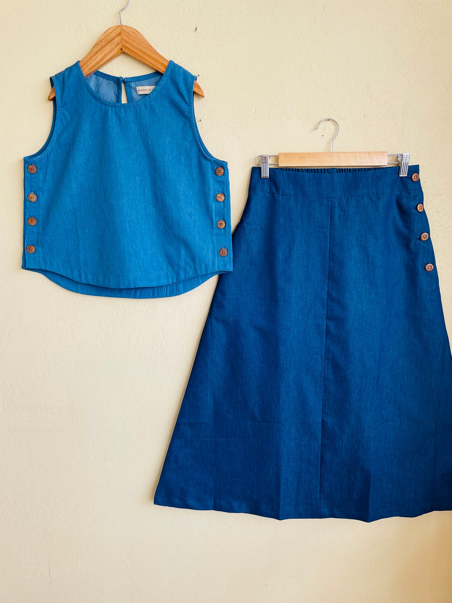 denim crop top in a lightweight denim fabric can be paired with denim pants or a denim skirt as a denim coord set